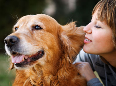 woman with golden retriever