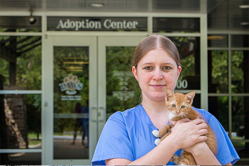 vet tech with cat